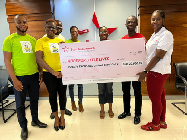 Mrs. Boatemaa Barfour-Awuah, CEO of Star Assurance (right) presenting a dummy cheque of the amount to Dr. Maame Tekyiwa Botchway, founder of ‘Hope for Little Lives,’ (2nd left). Looking on are other officials of Star Assurance and ‘Hope for Little Lives’.